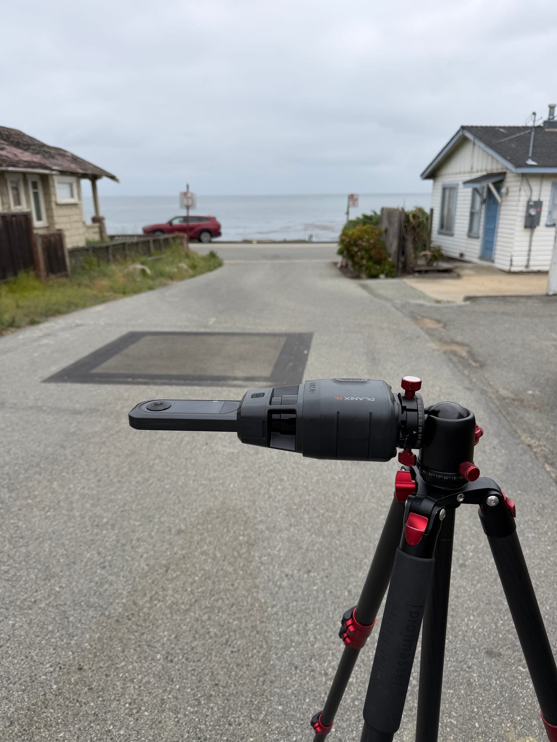 iGUIDE Planix Pro 3D scanner on a tripod capturing a residential aec scan, monterey, ca in Northern California